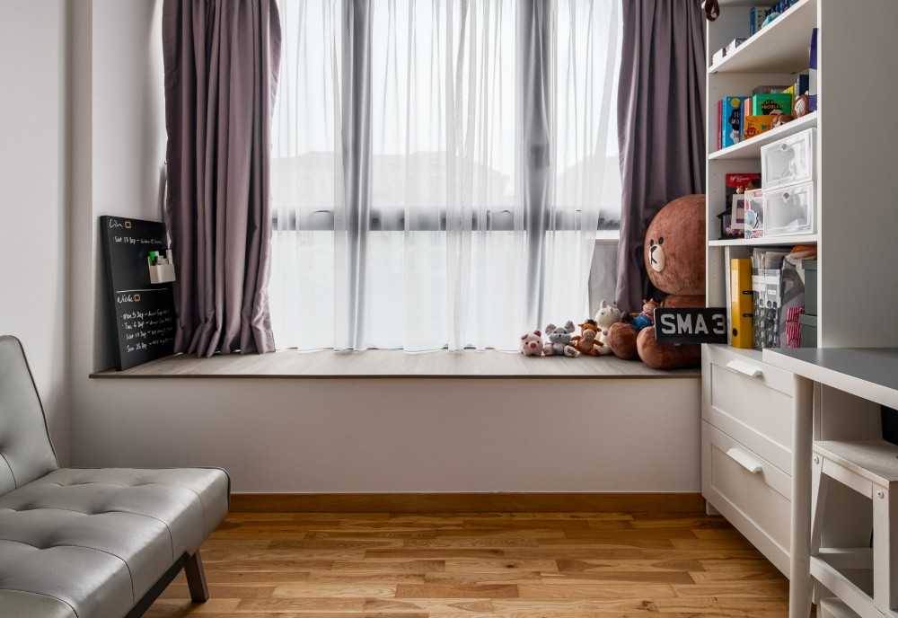 scandinavian bedroom with bookshelf and parquet floor