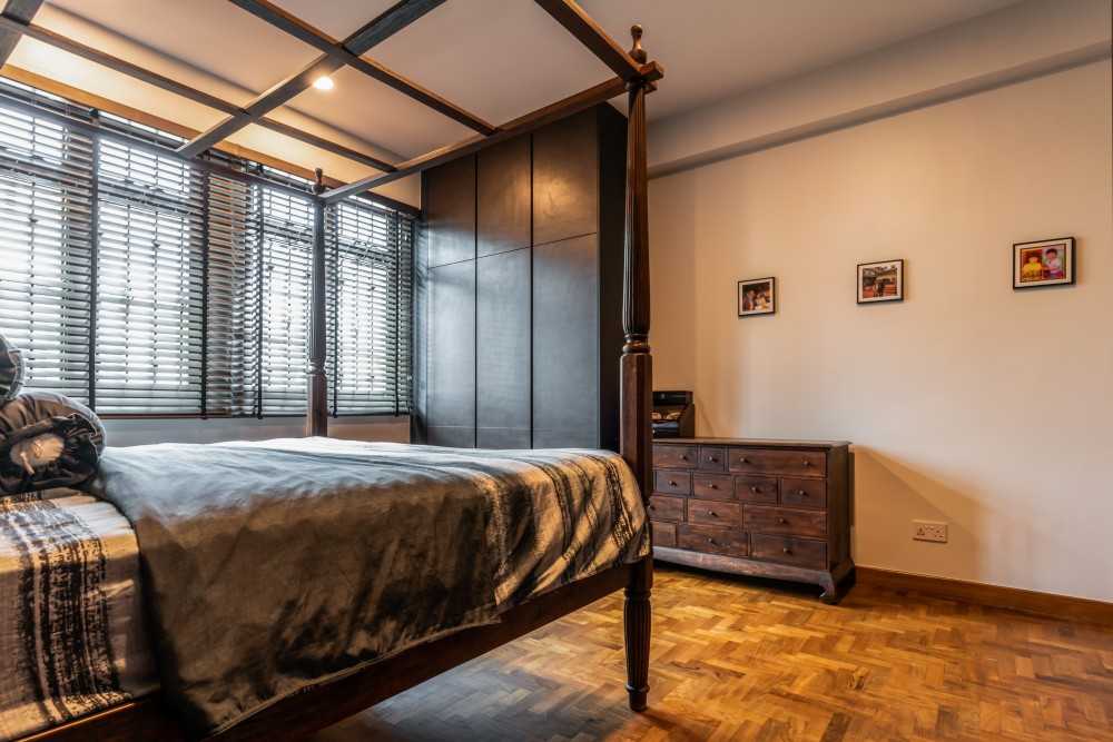 asian bedroom with parquet floor and wardrobe