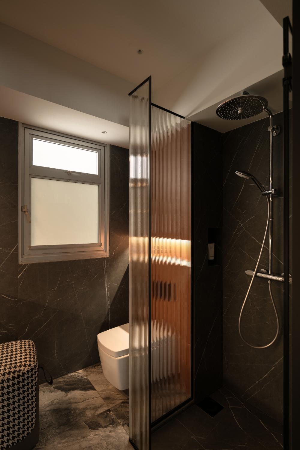 contemporary bathroom with marble floor and rainshower