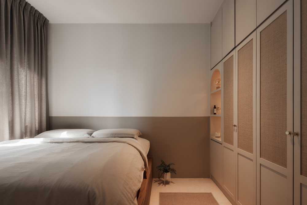 modern bedroom with platform bed and wardrobe