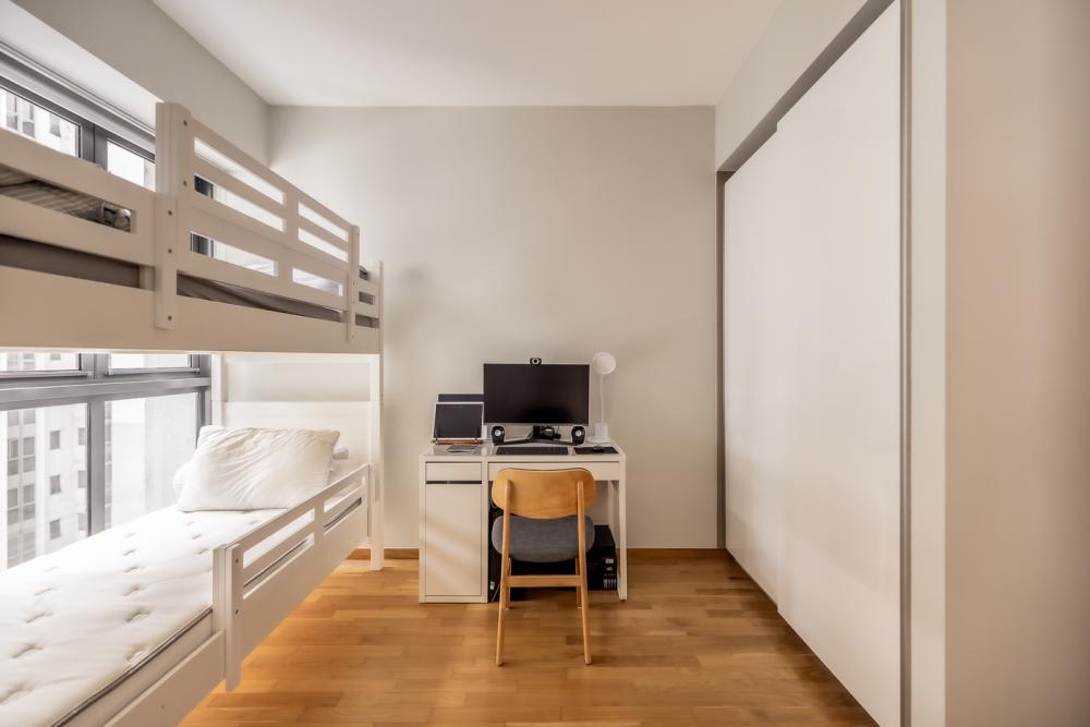 minimalist bedroom with parquet floor and wardrobe