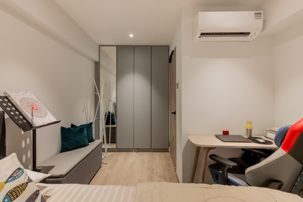 modern bedroom with vinyl flooring and mirror