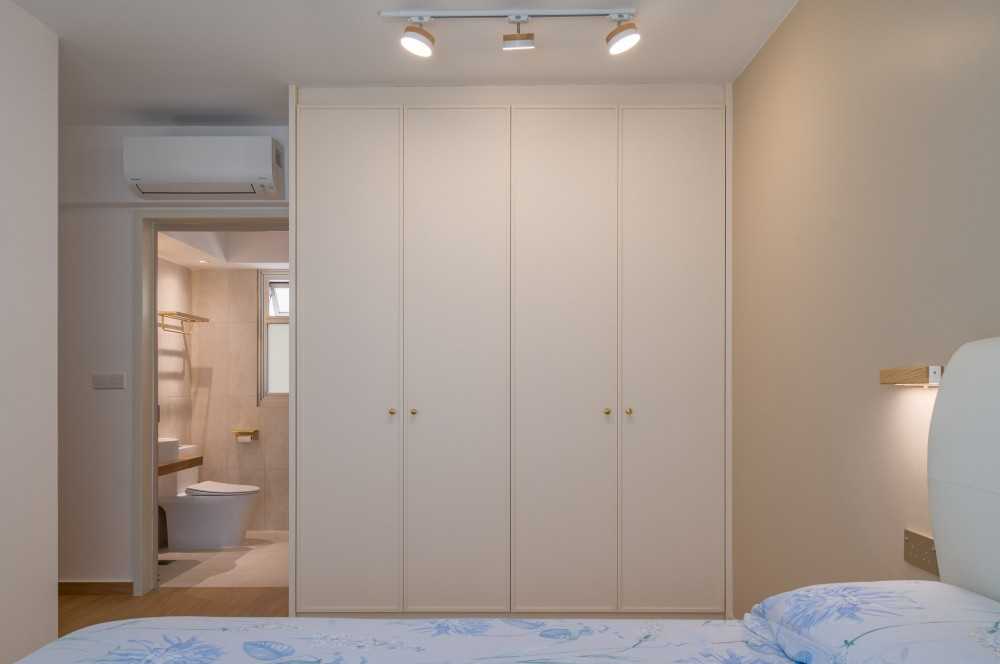 minimalist bedroom with wardrobe and flooring