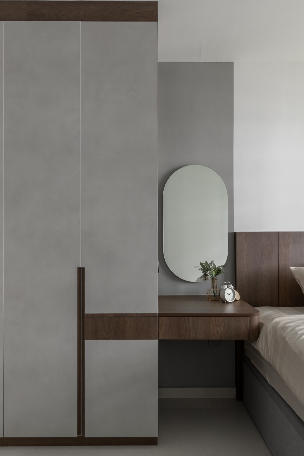 contemporary bedroom with mirror and wardrobe