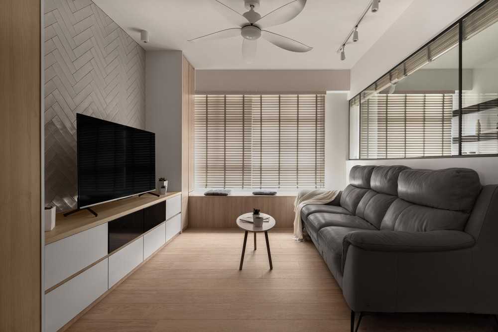 scandinavian living room with herringbone tiling and wood flooring