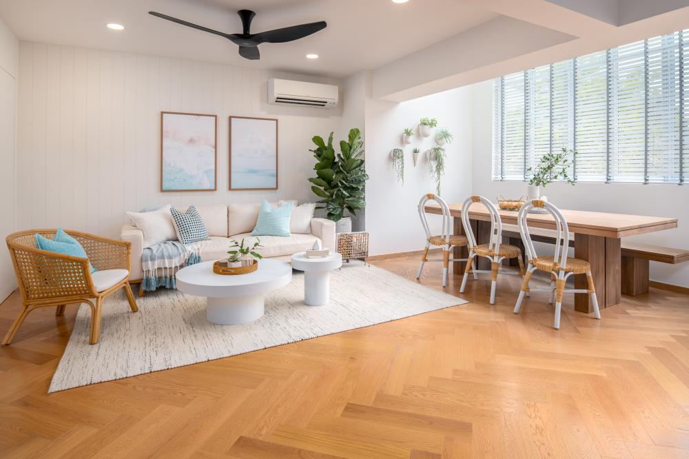 transitional living room with herringbone tiling and wood flooring