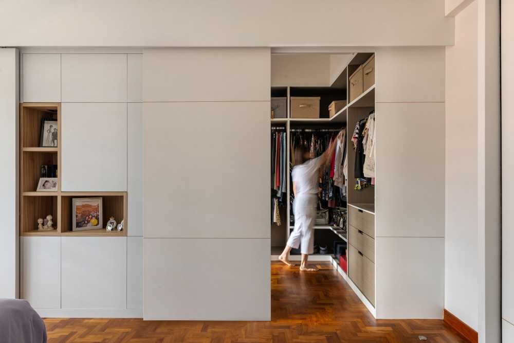 scandinavian walk in wardrobe with mirror and wardrobe