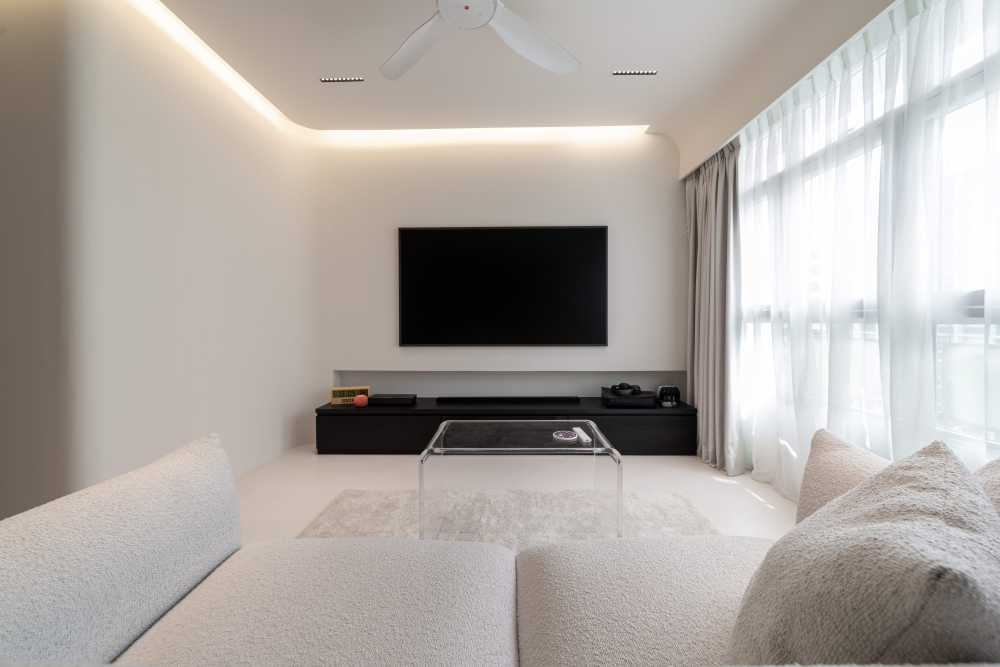 minimalist living room with cement floor and tv console