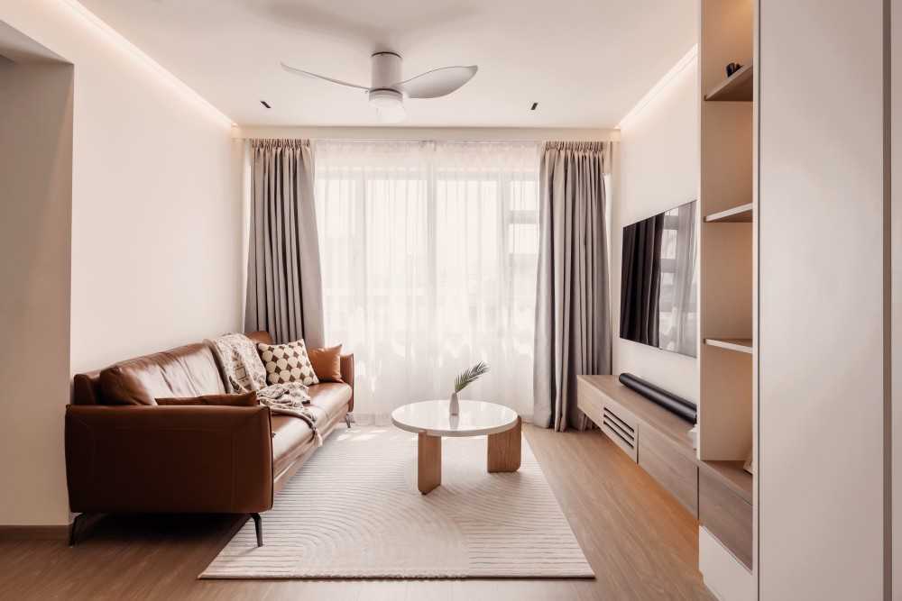 minimalist living room with tv console and curtain