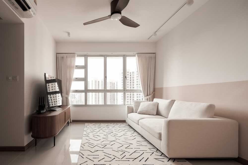 scandinavian living room with tv console and curtain